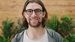 Face, man and smile in office with glasses, prescription lens and optical health for advertising job. Marketing, person and good eyesight in workplace with spectacles, new frames and vision wellness.