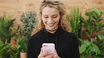 Creative agency, smile and woman in office, smartphone for social media and app for online reading. Person, scroll and employee in workplace, chatting and cellphone for email and message to contact