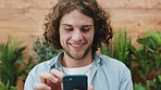 Business, funny and man in office, smartphone for social media and digital app for online humor. Person, smile and writer in workplace, laughing or cellphone for email, chatting or message to contact