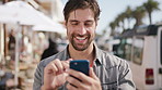 Man, phone and laugh with texting in city for travel, happy and funny chat with online dating. Person, smartphone and smile on mobile app for meme, notification or social media with tourism in town