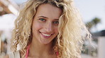 Happy, confident and face of woman in city for holiday, getaway or weekend trip in summer with relax. Smile, travel and portrait of female person on vacation with positive attitude in urban town.