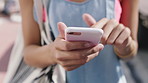 Hands, phone and scroll with texting in city with travel, bag and booking taxi on web for commute. Person, smartphone and click on mobile app, notification or social media with tourism in urban town