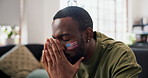 Frustrated, man and sports fan in home for watching tv, football match loss or upset for game defeat. Disappointed, black person and broadcast with soccer world cup, stress or competition fail in USA