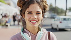 Summer, vacation and face of girl with smile on city street for travel, holiday or weekend in break. Portrait, tourist and sightseeing with happy woman, laugh and relax outdoors for trip in Miami