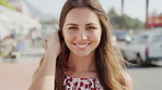 Travel, vacation and face of girl with smile on city street for summer, holiday or weekend in break. Portrait, tourist and sightseeing with happy woman, laugh and relax outdoors for trip in Miami