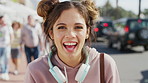 Summer, vacation and face of girl with laugh on city street for travel, holiday or weekend in break. Portrait, tourist and sightseeing with happy woman, smile and relax outdoors for trip in Miami
