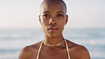 Summer, fashion and face of black woman on beach for holiday, vacation and relax on weekend. Travel, style and portrait of person with attitude by ocean, sea and nature for tourism in South Africa
