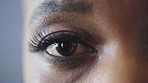 Optometry, eye care and face of black woman in studio with contact lenses for prescription for eyesight. Wellness, optical health and African person by gray background with vision or medical test.