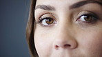 Optometry, eye health and portrait of woman in studio with contact lenses for prescription for eyesight. Wellness, optical care and person by gray background with vision, test or ophthalmology.