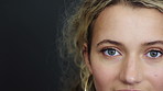 Optometry, space and face of woman in studio with contact lenses for prescription for eyesight. Eye care, optical health and portrait of person by gray background with vision, test or ophthalmology.
