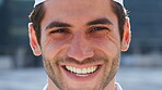 Face, funny and reaction with happy man outdoor for expression, good news or positive attitude. Laughing, satisfaction and teeth of excited person in urban city for inspiration, joy or opportunity