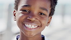 Face, teeth and happy child outdoor for dental wellness, orthodontics and gum care for dentistry. Portrait, smile and African boy with oral health, development and shine with mouth hygiene