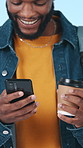 Laughing, man and texting with smartphone in studio, university student and chat with contact on web. Blue background, online and black person with coffee on break, typing and funny message with app
