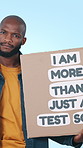 Education, protest and poster with face of black man in studio for rally, university and politics. Future, sign and African person on blue background for school, freedom and justice for equality