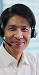 Face, Asian man and smile with headset at call centre for career pride, contact us and customer service. Portrait, male person and agent for technical support, crm representative and agency in Japan