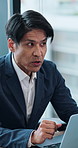 Meeting, manager or Asian man in office with laptop, problem solving or funding idea in budget pitch. Brief, collaboration or finance director with tech, feedback or investment plan in Japan.