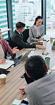 Accounting, business people and paperwork in office for meeting, review or communication for teamwork. Employees, investment report and tech for briefing, revenue project and brainstorming in Japan