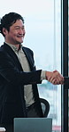Happy, businessman and meeting with handshake in conference for partnership or introduction. Man, employee or shaking hands with smile for hiring, recruiting or onboarding deal together in workplace