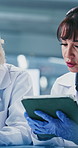 Scientist, women and team with tablet at laboratory with talk, feedback and medical research. Mature people, collaboration and checklist with tech, pharma study or application for vaccine development