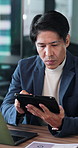 Tablet, business and Japanese man in office for thinking, review proposal or insurance policy. Reading, tech and mature broker in workplace for problem solving, risk management or corporate coverage