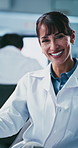 Science, microscope and face of woman in laboratory for vaccine research, disease cure and happy. Medical innovation, smile and study with mature person for healthcare discovery and biotechnology 