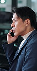 Business, phone call and thinking with Japanese man in office for feedback or problem solving. Concern, conversation and serious with Asian employee in workplace for discussion, planning or solution