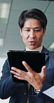Tablet, meeting and Japanese man in office for planning, review proposal or insurance policy. Team, tech and mature broker in workplace for discussion of agenda, risk management or corporate coverage