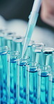 Scientist, pipette and liquid in test tubes in lab for enzyme analysis, biological staining or innovation. Science, person and vial samples in containers for cell culture, medical research or closeup