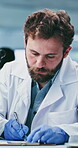 Science, microscope and writing with man in laboratory for vaccine research, disease cure and checklist. Medical innovation, notes and study with person for healthcare discovery and biotechnology 