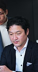 Business people, discussion and meeting in office for collaboration, planning and development. Team, manager and communication in workplace for approval, feedback and project brainstorming in Japan