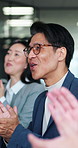 Meeting, team or Asian man in office with clap, celebration or approval of investment proposal. Collaboration, people or finance consultants with applause, revenue growth or funding success in Japan.