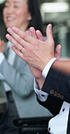 Meeting, team or hands in office with clap, celebration or approval of investment proposal. Collaboration, people or finance consultants with applause, revenue growth or funding success in Japan.