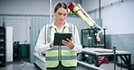 Engineer, robotics and woman on tablet in factory for assembly line, software update and inspection. Automation, online and person on digital tech for system diagnostics, design or technical manual