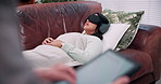 Consultation, therapy and woman with blindfold, headphones and session for recovery or support. Counselor, psychologist and patient with sensory depravation for mental health, check up and help