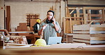 Argument, carpentry and phone call with man in workshop for disagreement or project management. Communication, conflict and frustration with person in woodworking factory for manufacturing stress