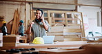 Phone call, smile and woodworking with man in factory for feedback, project management or update. Conversation, explain and progress with person in carpentry warehouse for mobile production order
