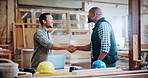 Meeting, carpenter and men with handshake in warehouse for deal, discussion or furniture production. Woodworking, people and shaking hands for timber supply, lumber and agreement for construction