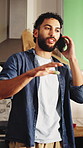 Phone call, chat and renovations with man in kitchen for subcontractor research, project and paint idea. Home improvement, remodeling and diy supplier contact with person in house for communication