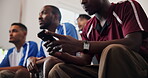 Friends, watching tv and man in house with phone for research, soccer player stats and sports betting. Below, typing and people with football match broadcast, mobile and line up news on social media