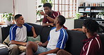People, soccer and discussion on sofa with team for match, live game or half time in home. Group, friends or talking with football fans for social conversation, strategy or sports debate in house