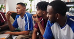 Men, soccer or watching tv with pizza on sofa for live game, entertainment or match in home. Male people, friends or group of football fans eating with food for social gathering or sport subscription