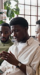 Men, discussion and watching sport with tablet for live game, match or entertainment in home. Male people, sports fans or friends talking with technology or app for online streaming or subscription