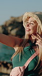 Happy, selfie and woman by ocean with peace sign, holiday greeting and memory in nature. Sun hat, female person and smile at beach with picture for summer, vacation and wave for social media post