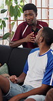 Friends, discussion and watching tv in home with sports competition, soccer game or bonding together. People, conversation and broadcast in living room with hangout, football fan or social gathering.