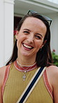 Laughing, face and woman on vacation in city, tourist and happiness on summer adventure and tourism. Outdoor, travel and person with smile on holiday, portrait or traveler on weekend getaway in Italy