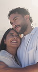 Smile, couple and hug with love outdoor for travel, adventure and bonding together. Happy, people and admiration with romantic embrace, partner affection and relationship commitment on vacation trip