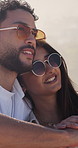 Outdoor, sunglasses or couple with conversation for vacation, tropical destination or anniversary getaway. Romantic trip, speaking or happy people with travel holiday for bonding, support or shades
