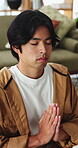Yoga, man and meditation with prayer hands in home for stress relief, inner peace or mindfulness. Calm, person and namaste pose in apartment for zen practice, spiritual healing and holistic wellness