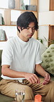 Man, drinking and water with pill for medication, healthcare prescription or antibiotic in home. Male person, patient or taking pharmaceutical with tablets, mineral liquid or beverage for remedy