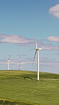 Sustainability, wind turbine and renewable energy in farm, drone or eco friendly with zero emissions. Grass field, windmill and natural resource for carbon footprint in environment, space and outdoor